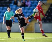 5 November 2023; Ellen Molloy of Wexford Youths in action against Hannah Healy of Shelbourne during the EA SPORTS Women’s U19 Cup Final between Wexford Youths and Shelbourne at Athlone Town Stadium in Westmeath. Photo by Seb Daly/Sportsfile