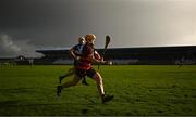 5 November 2023; Peter Hogan of Ballygunner in action against Aaron Myers of Sarsfields during the AIB Munster GAA Hurling Senior Club Championship quarter-final match between Ballygunner and Sarsfields at Walsh Park in Waterford. Photo by Eóin Noonan/Sportsfile