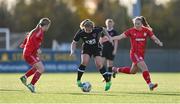 5 November 2023; Ellen Molloy of Wexford Youths in action against Shelbourne players Leah Tighe, left, and Erin Kate Healy during the EA SPORTS Women’s U19 Cup Final between Wexford Youths and Shelbourne at Athlone Town Stadium in Westmeath. Photo by Seb Daly/Sportsfile
