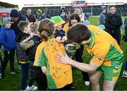 5 November 2023; Gavin Burke of Corofin signs a jersey after his side's victory in the Galway County Senior Club Football Championship final match between Corofin and Moycullen at Pearse Stadium in Galway. Photo by Harry Murphy/Sportsfile