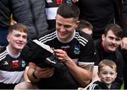 5 November 2023; Newcastle West joint-captain Iain Corbett with his son Dylan, who was born on Tuesday, October 31, 2023, after the Limerick County Senior Club Football Championship final match between Adare and Newcastle West at TUS Gaelic Grounds in Limerick. Photo by Tom Beary/Sportsfile