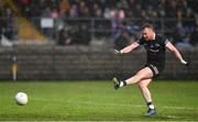 5 November 2023; Paul Devlin of Kilcoo scores his side's first goal from a penalty during the AIB Ulster GAA Football Senior Club Championship round 1 match between Derrygonnelly Harps of Fermanagh and Kilcoo of Down at Brewster Park in Enniskillen, Fermanagh. Photo by Ramsey Cardy/Sportsfile