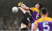 5 November 2023; Ceilum Doherty of Kilcoo in action against Rian McGovern of Derrygonnelly Harps during the AIB Ulster GAA Football Senior Club Championship round 1 match between Derrygonnelly Harps of Fermanagh and Kilcoo of Down at Brewster Park in Enniskillen, Fermanagh. Photo by Ramsey Cardy/Sportsfile