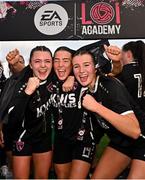5 November 2023; Wexford Youths players, from left, Molly Garland, Molly Garland and Siun Murdiff celebrate after their side's victory in the EA SPORTS Women’s U19 Cup Final between Wexford Youths and Shelbourne at Athlone Town Stadium in Westmeath. Photo by Seb Daly/Sportsfile