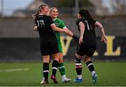 5 November 2023; Wexford Youths players Freya de Mange, left, goalkeeper Claudia Keenan and Michaela Lawrence celebrate after their side's victory in the EA SPORTS Women’s U19 Cup Final between Wexford Youths and Shelbourne at Athlone Town Stadium in Westmeath. Photo by Seb Daly/Sportsfile