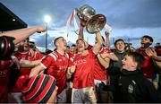 5 November 2023; East Kerry captain Paudie Clifford and teammates, including Ronan Buckley and David Clifford, celebrate with the Bishop Moynihan cup after the Kerry County Senior Football Championship final match between Mid Kerry and East Kerry at Austin Stack Park in Tralee, Kerry. Photo by Brendan Moran/Sportsfile