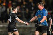 5 November 2023; Callum Rogers of Kilcoo and Derrygonnelly Harps goalkeeper Jack Kelly shake hands after the AIB Ulster GAA Football Senior Club Championship round 1 match between Derrygonnelly Harps of Fermanagh and Kilcoo of Down at Brewster Park in Enniskillen, Fermanagh. Photo by Ramsey Cardy/Sportsfile