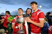 5 November 2023; East Kerry captain Paudie Clifford, left, and brother David Clifford, and David's son Ogie, celerate with the Bishop Moynihan cup after the Kerry County Senior Football Championship final match between Mid Kerry and East Kerry at Austin Stack Park in Tralee, Kerry. Photo by Brendan Moran/Sportsfile
