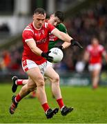 5 November 2023; Darragh Roche of East Kerry in action against Darren Houlihan of Mid Kerry during the Kerry County Senior Football Championship final match between Mid Kerry and East Kerry at Austin Stack Park in Tralee, Kerry. Photo by Brendan Moran/Sportsfile