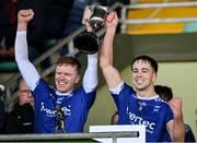 5 November 2023; Reenard joint captains Alan Curran, left, and Cian O'Leary lift the cup after the Kerry County Junior Club Football Championship final match between Reenard and Tarbert at Austin Stack Park in Tralee, Kerry. Photo by Brendan Moran/Sportsfile
