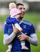 5 November 2023; Killian Young of Reenard celebrates with his daughter Cadhla after the Kerry County Junior Club Football Championship final match between Reenard and Tarbert at Austin Stack Park in Tralee, Kerry. Photo by Brendan Moran/Sportsfile