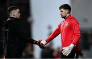 3 November 2023; Tadhg Ryan, right, and Derry City goalkeeper Brian Maher before the SSE Airtricity Men's Premier Division match between Derry City and St Patrick's Athletic at The Ryan McBride Brandywell Stadium in Derry. Photo by Ramsey Cardy/Sportsfile