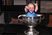 6 November 2023; Rían Whelan, aged 1, with the Sam Maguire Cup during the launch of A Season of Sundays 2023 at The Croke Park Hotel in Dublin. Photo by Piaras Ó Mídheach/Sportsfile