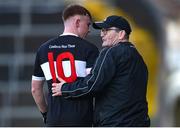 5 November 2023; Newcastle West manager Jimmy Lee speaks with Aaron Neville during the Limerick County Senior Club Football Championship final match between Adare and Newcastle West at TUS Gaelic Grounds in Limerick. Photo by Tom Beary/Sportsfile