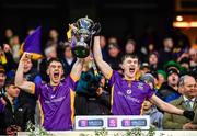 22 January 2023; Kilmacud Crokes players Dara Mullin, left, and Michael Mullin lift the Andy Merrigan Cup after their side's victory in the AIB GAA Football All-Ireland Senior Club Championship Final match between Watty Graham's Glen of Derry and Kilmacud Crokes of Dublin at Croke Park in Dublin. Photo by Piaras Ó Mídheach/Sportsfile