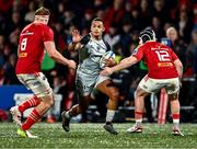 4 November 2023; Will Reed of Dragons in action against Gavin Coombes, 8, and Rory Scannell of Munster during the United Rugby Championship match between Munster and Dragons at Musgrave Park in Cork. Photo by Piaras Ó Mídheach/Sportsfile