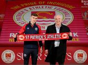 9 November 2023; Mason Melia of St Patrick's Athletic poses with chairman Garrett Kelleher after signing his first professional contract, a three year deal, at Richmond Park in Dublin. Photo by Stephen McCarthy/Sportsfile
