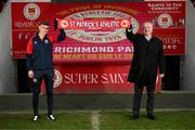 9 November 2023; Mason Melia of St Patrick's Athletic poses with chairman Garrett Kelleher after signing his first professional contract, a three year deal, at Richmond Park in Dublin. Photo by Stephen McCarthy/Sportsfile