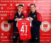 9 November 2023; Mason Melia of St Patrick's Athletic poses with manager Jon Daly after signing his first professional contract, a three year deal, at Richmond Park in Dublin. Photo by Stephen McCarthy/Sportsfile