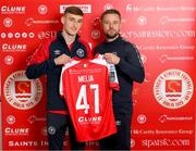 9 November 2023; Mason Melia of St Patrick's Athletic poses with director of football Ger O'Brien after signing his first professional contract, a three year deal, at Richmond Park in Dublin. Photo by Stephen McCarthy/Sportsfile