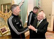 10 November 2023; President of Ireland Michael D Higgins receives 2023 Men's FAI Cup finalist Keith Buckley of Bohemians and manager Declan Devine at Áras an Uachtaráin in the Phoenix Park, Dublin, ahead of the 2023 Sports Direct Men's FAI Cup Final between Bohemians and St Patrick's Athletic to be held on Sunday at the Aviva Stadium in Dublin. Photo by Stephen McCarthy/Sportsfile