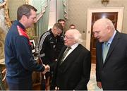 10 November 2023; President of Ireland Michael D Higgins receives 2023 Men's FAI Cup finalist manager Jon Daly of St Patrick's Athletic in the company of FAI President Gerry McAnaney at Áras an Uachtaráin in the Phoenix Park, Dublin, ahead of the 2023 Sports Direct Men's FAI Cup Final between Bohemians and St Patrick's Athletic to be held on Sunday at the Aviva Stadium in Dublin. Photo by Stephen McCarthy/Sportsfile