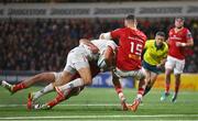 10 November 2023; Ethan McIlroy of Ulster is tackled by Munster players Diarmuid Barron, left, and Shane Daly, who subsequently recevied a yellow card, during the United Rugby Championship match between Ulster and Munster at Kingspan Stadium in Belfast. Photo by Seb Daly/Sportsfile