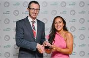 10 November 2023; Personality of the Year recipient, Cork camogie player Amy O’Connor is presented with her award by Gaelic Writers chairman Karl O'Kane at the Gaelic Writers’ Association Awards, supported by EirGrid, at the Iveagh Garden Hotel in Dublin. Photo by Brendan Moran/Sportsfile