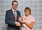 10 November 2023; Former Monaghan footballer Brenda McAnespie is presented with her Ladies Football Hall of Fame award by Gaelic Writers Association chairperson Karl O'Kane at the 2023 Gaelic Writers' Association Awards, supported by EirGrid, at the Iveagh Garden Hotel in Dublin. Photo by Brendan Moran/Sportsfile