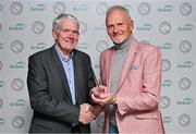 10 November 2023; Former Irish Independent chief sports writer Vincent Hogan is presented with his Lifetime Achievement award by Mediahuis GAA journalist Martin Breheny, left, at the 2023 Gaelic Writers' Association Awards, supported by EirGrid, at the Iveagh Garden Hotel in Dublin. Photo by Brendan Moran/Sportsfile