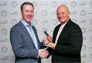 10 November 2023; Former Antrim hurler Terence McNaughton is presented with his Hurling Hall of Fame award by Gaelic Writers Association secretary Pat Nolan, left, at the 2023 Gaelic Writers' Association Awards, supported by EirGrid, at the Iveagh Garden Hotel in Dublin. Photo by Brendan Moran/Sportsfile