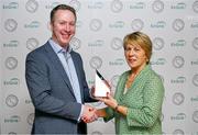 10 November 2023; Former Kilkenny camogie player Ann Downey is presented with her Camogie Hall of Fame award by Gaelic Writers Association secretary Pat Nolan, left, at the 2023 Gaelic Writers' Association Awards, supported by EirGrid, at the Iveagh Garden Hotel in Dublin. Photo by Brendan Moran/Sportsfile