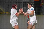 10 November 2023; Jacob Stockdale of Ulster, right, celebrates with teammate Eric O’Sullivan after scoring their side's first try during the United Rugby Championship match between Ulster and Munster at Kingspan Stadium in Belfast. Photo by Seb Daly/Sportsfile