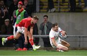 10 November 2023; Jacob Stockdale of Ulster scores his side's first try during the United Rugby Championship match between Ulster and Munster at Kingspan Stadium in Belfast. Photo by Seb Daly/Sportsfile