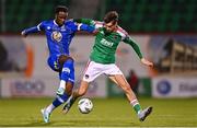 10 November 2023; Roland Idowu of Waterford in action against John O'Donovan of Cork City during the SSE Airtricity Men's Promotion / Relegation play-off match between Waterford and Cork City at Tallaght Stadium in Dublin. Photo by Tyler Miller/Sportsfile