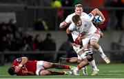 10 November 2023; Iain Henderson of Ulster is tackled by Brian Gleeson of Munster during the United Rugby Championship match between Ulster and Munster at Kingspan Stadium in Belfast. Photo by Ramsey Cardy/Sportsfile