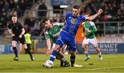 10 November 2023; Ronan Coughlan of Waterford in action against Aaron Bolger of Cork City during the SSE Airtricity Men's Promotion / Relegation play-off match between Waterford and Cork City at Tallaght Stadium in Dublin. Photo by Tyler Miller/Sportsfile