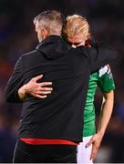 10 November 2023; Jonas Häkkinen of Cork City is consoled by Cork City manager Richie Holland after their side's defeat in the SSE Airtricity Men's Promotion / Relegation play-off match between Waterford and Cork City at Tallaght Stadium in Dublin. Photo by Tyler Miller/Sportsfile