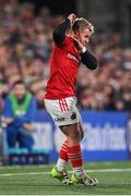 10 November 2023; Craig Casey of Munster reacts to an injury during the United Rugby Championship match between Ulster and Munster at Kingspan Stadium in Belfast. Photo by Seb Daly/Sportsfile