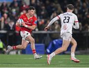 10 November 2023; Calvin Nash of Munster in action against Jude Postlethwaite of Ulster during the United Rugby Championship match between Ulster and Munster at Kingspan Stadium in Belfast. Photo by Seb Daly/Sportsfile