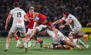 10 November 2023; Brian Gleeson of Munster is tackled by Scott Wilson of Ulster during the United Rugby Championship match between Ulster and Munster at Kingspan Stadium in Belfast. Photo by Seb Daly/Sportsfile