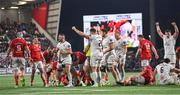 10 November 2023; Ulster players, including John Cooney, celebrate at the final whistle after their side's victory in the United Rugby Championship match between Ulster and Munster at Kingspan Stadium in Belfast. Photo by Seb Daly/Sportsfile