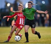 11 November 2023; Dearbhaile Beirne of Peamount United is tackled by Casey Howe of Sligo Rovers during the SSE Airtricity Women's Premier Division match between Peamount United and Sligo Rovers at PRL Park in Greenogue, Dublin. Photo by Stephen McCarthy/Sportsfile