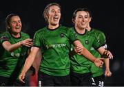 11 November 2023; Ellen Dolan of Peamount United, centre, celebrates with team-mates Erin McLoughlin, left, and Sadhbh Doyle, right, after scoring her side's fourth goal during the SSE Airtricity Women's Premier Division match between Peamount United and Sligo Rovers at PRL Park in Greenogue, Dublin. Photo by Stephen McCarthy/Sportsfile