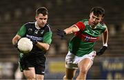 11 November 2023; Jack Goulding of Fulham Irish in action against Liam Golden of Ballina Stephenites during the AIB Connacht GAA Football Senior Club Championship quarter-final match between Ballina Stephenites, Mayo, and Fulham Irish, London, at Hastings Insurance MacHale Park in Castlebar, Mayo. Photo by Piaras Ó Mídheach/Sportsfile