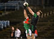 11 November 2023; Chris Duggan of Fulham Irish in action against Ger Cafferkey of Ballina Stephenites during the AIB Connacht GAA Football Senior Club Championship quarter-final match between Ballina Stephenites, Mayo, and Fulham Irish, London, at Hastings Insurance MacHale Park in Castlebar, Mayo. Photo by Piaras Ó Mídheach/Sportsfile