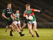 11 November 2023; Mark Binnane of Ballina Stephenites passes under pressure from David O'Connor of Fulham Irish during the AIB Connacht GAA Football Senior Club Championship quarter-final match between Ballina Stephenites, Mayo, and Fulham Irish, London, at Hastings Insurance MacHale Park in Castlebar, Mayo. Photo by Piaras Ó Mídheach/Sportsfile