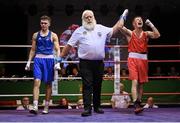 11 November 2023; Jude Gallagher of Two Castles Boxing Club, Tyrone, left, is declared victorious over Adam Hession of Monivea Boxing Club, Galway, after their featherweight 57kg final bout at the IABA National Elite Boxing Championships 2024 Finals at the National Boxing Stadium in Dublin. Photo by Seb Daly/Sportsfile