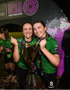 11 November 2023; Dora Gorman, left, and Sadhbh Doyle of Peamount United celebrate with the SSE Airtricity Women's Premier Division trophy after the SSE Airtricity Women's Premier Division match between Peamount United and Sligo Rovers at PRL Park in Greenogue, Dublin. Photo by Stephen McCarthy/Sportsfile