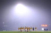 11 November 2023; The Crossmaglen Rangers team during the playing of the National Anthem before the AIB Ulster GAA Football Senior Club Championship quarter-final match between Trillick of Tyrone and Crossmaglen Rangers of Armagh at O'Neills Healy Park in Omagh, Tyrone. Photo by Ramsey Cardy/Sportsfile